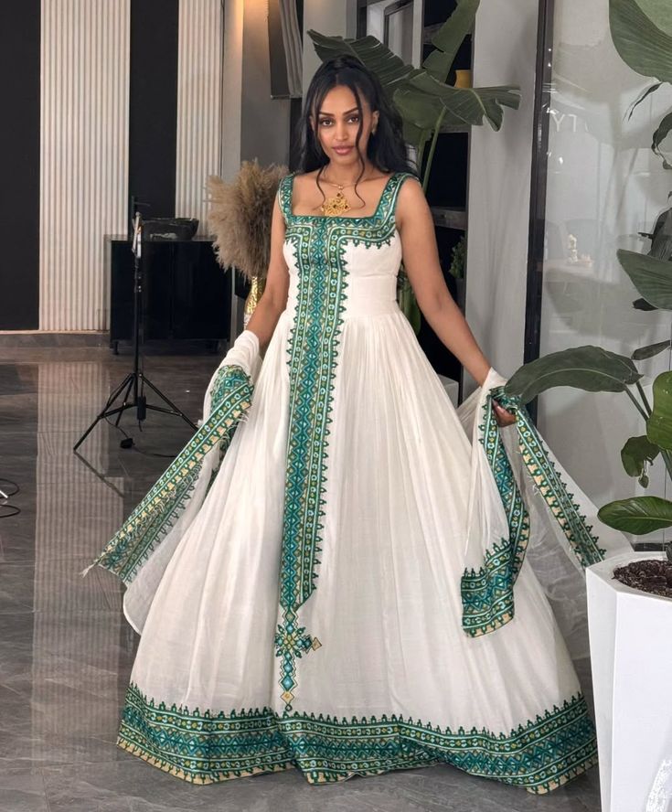 traditional dresses_Elegance in green Habesha Kemis beautiful Habesha dress