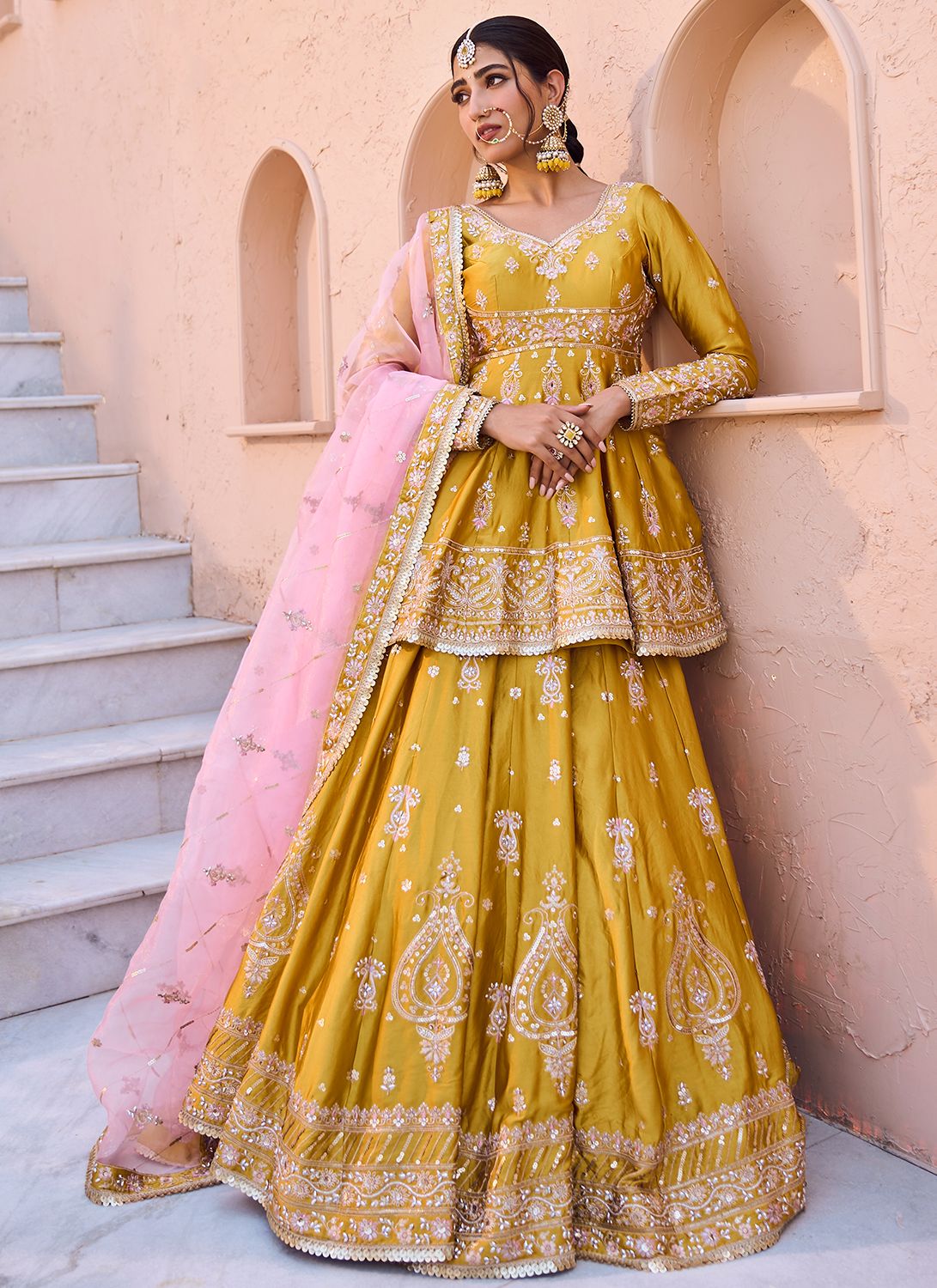 traditional dresses_Yellow Embroidered Peplum Style Lehenga