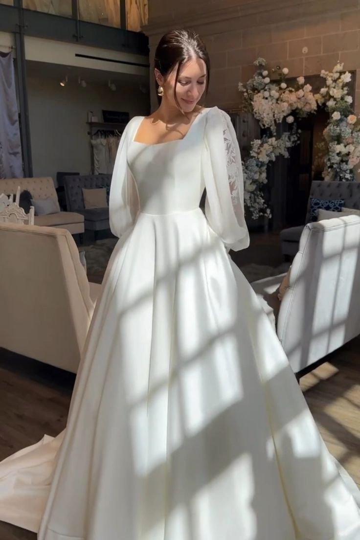 elegant dresses_Classic Winter Wedding Dress with Statement Sleeves and Timeless Silhouette